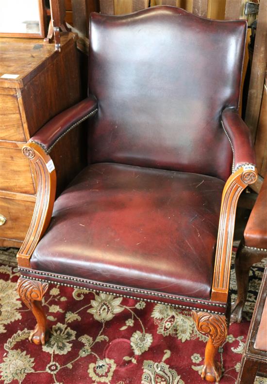 Brown leather upholstered desk chair